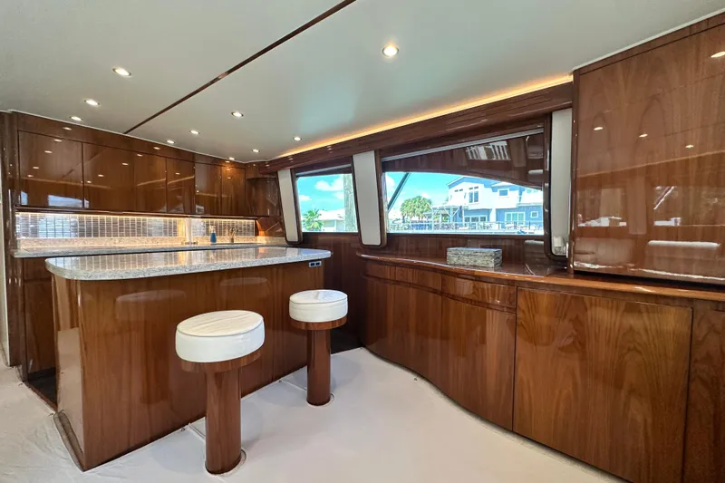 Wildcatter Yacht Photos Pics Luxurious interior of 2017 Viking 55 Convertible yacht with polished wood and modern design.