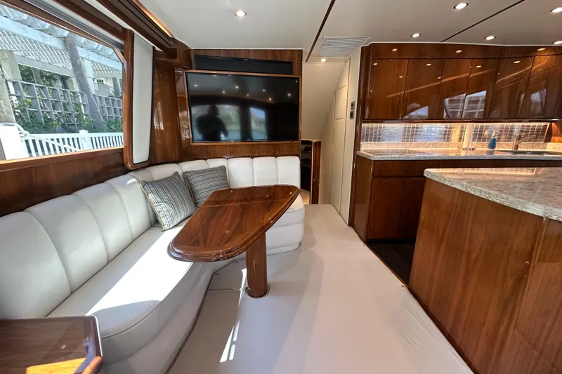 Wildcatter Yacht Photos Pics Luxurious interior of 2017 Viking 55 Convertible yacht with elegant seating and modern kitchen.