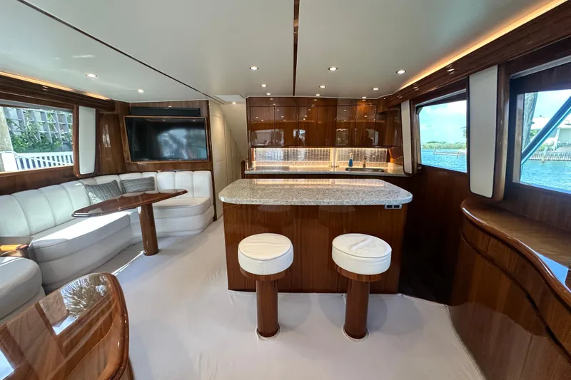 Wildcatter Yacht Photos Pics Luxurious interior of 2017 Viking 55 Convertible yacht with elegant seating and modern kitchen.