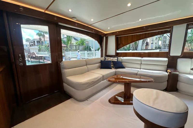 Wildcatter Yacht Photos Pics Luxurious interior of 2017 Viking 55 Convertible yacht with plush seating and elegant wood finishes.