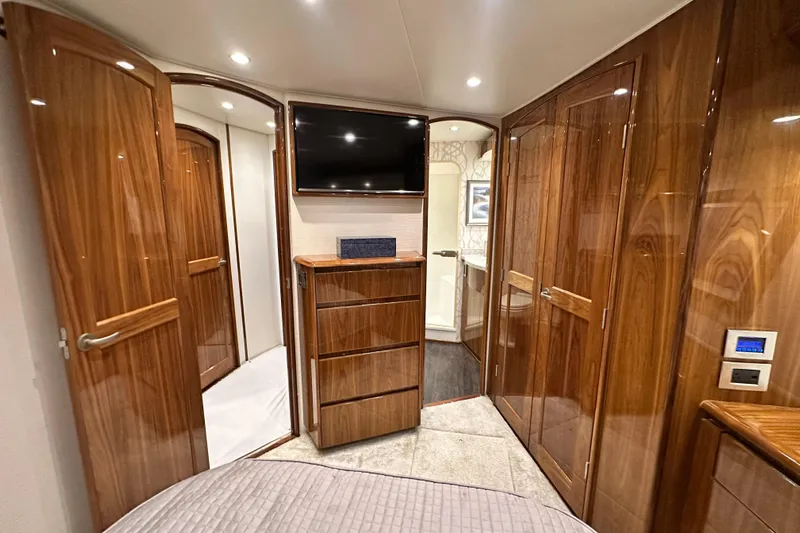Wildcatter Yacht Photos Pics Luxurious interior of 2017 Viking 55 Convertible yacht with wood finishes and modern amenities.