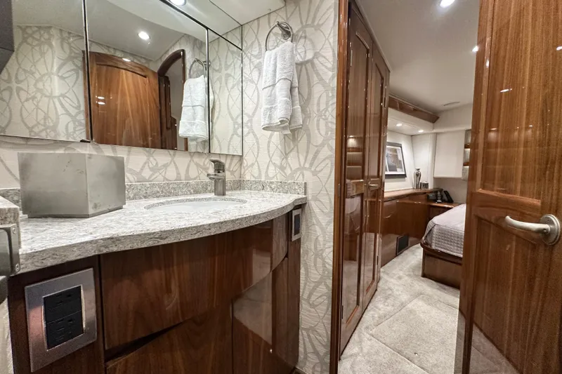 Wildcatter Yacht Photos Pics Luxurious bathroom and cabin interior of 2017 Viking 55 Convertible yacht.