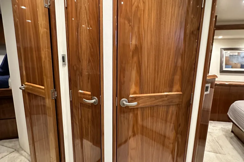 Wildcatter Yacht Photos Pics Interior of 2017 Viking 55 Convertible yacht with polished wooden doors.