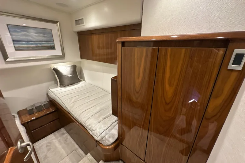 Wildcatter Yacht Photos Pics Luxurious cabin interior of 2017 Viking 55 Convertible yacht with elegant wood finishes.