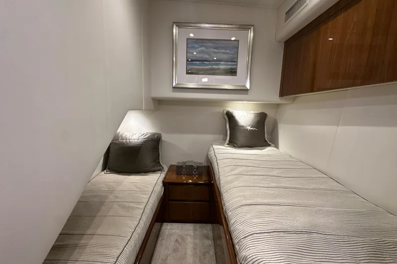 Wildcatter Yacht Photos Pics Interior of 2017 Viking 55 Convertible yacht with twin beds and elegant decor.