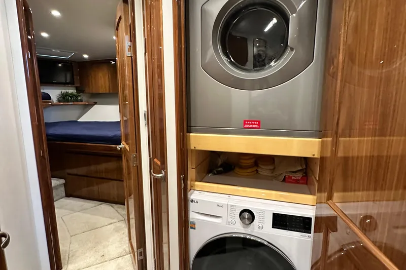 Wildcatter Yacht Photos Pics Laundry area in 2017 Viking 55 Convertible yacht with washer and dryer.