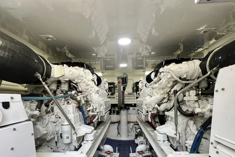 Wildcatter Yacht Photos Pics Engine room of 2017 Viking 55 Convertible yacht, featuring dual powerful engines.