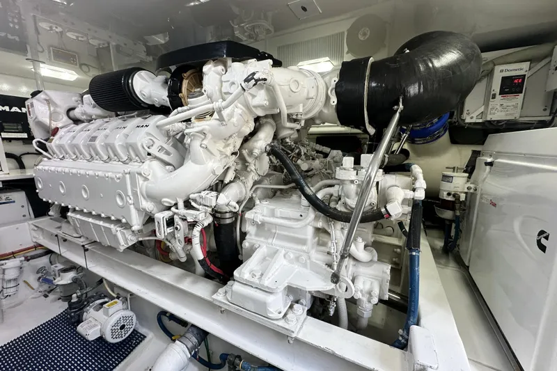 Wildcatter Yacht Photos Pics Engine room of 2017 Viking 55 Convertible yacht, featuring a powerful marine engine.