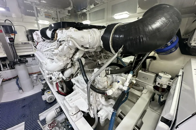 Wildcatter Yacht Photos Pics Engine room of 2017 Viking 55 Convertible yacht, showcasing detailed machinery and components.