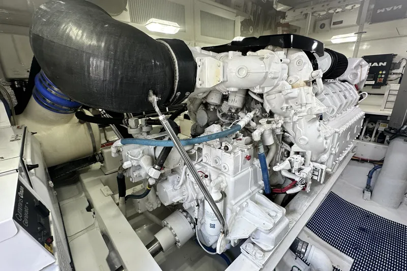 Wildcatter Yacht Photos Pics Engine room of a 2017 Viking 55 Convertible yacht, showcasing a powerful marine engine.