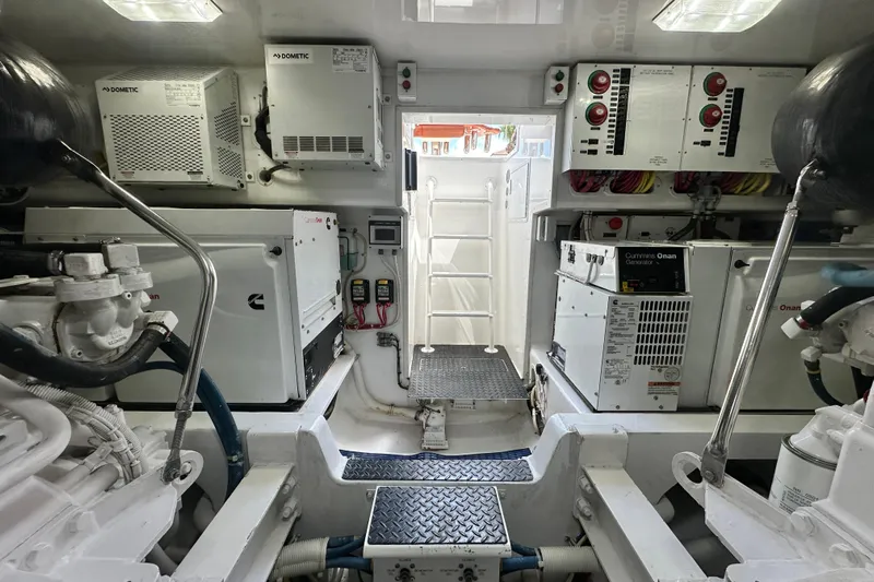 Wildcatter Yacht Photos Pics Engine room of 2017 Viking 55 Convertible yacht with Cummins Onan generators and Dometic systems.