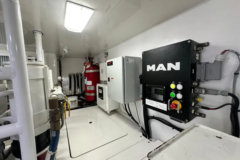 Wildcatter Yacht Photos Pics Engine room of 2017 Viking 55 Convertible yacht with MAN control panel and equipment.