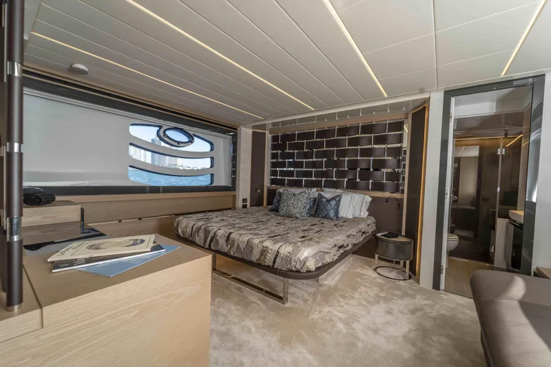 M Yacht Photos Pics Luxurious bedroom interior of 2018 Pershing 70 yacht with modern design and elegant furnishings.