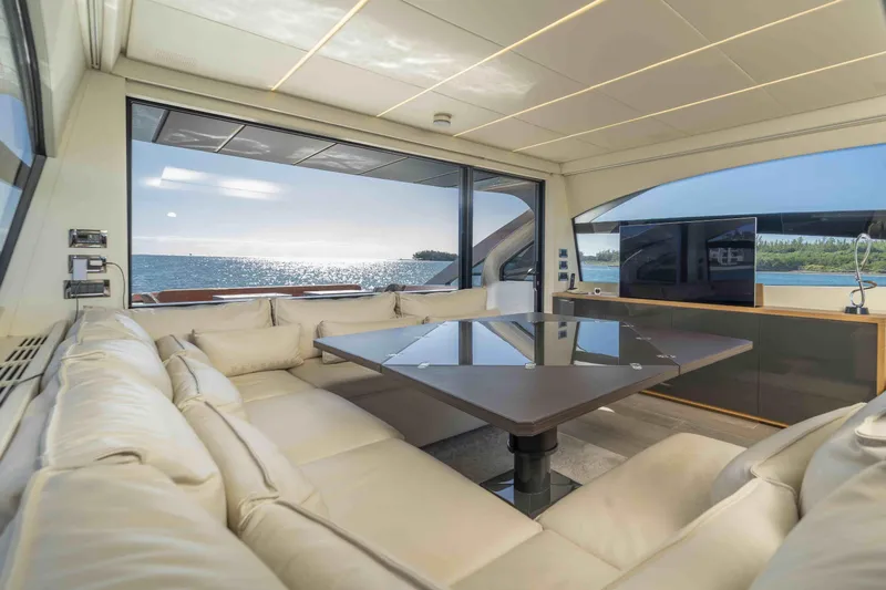 M Yacht Photos Pics Luxurious interior of 2018 Pershing 70 yacht with ocean view and modern furnishings.