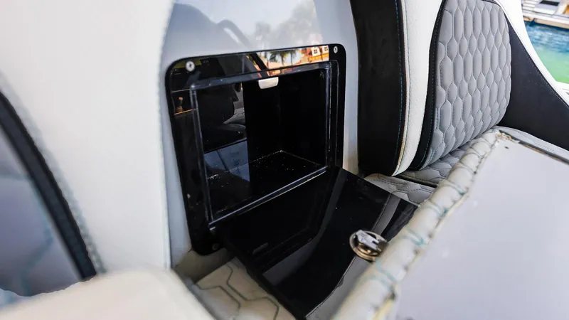  Yacht Photos Pics 2022 Deep Impact 399 Cabin interior storage compartment with sleek design and modern upholstery.