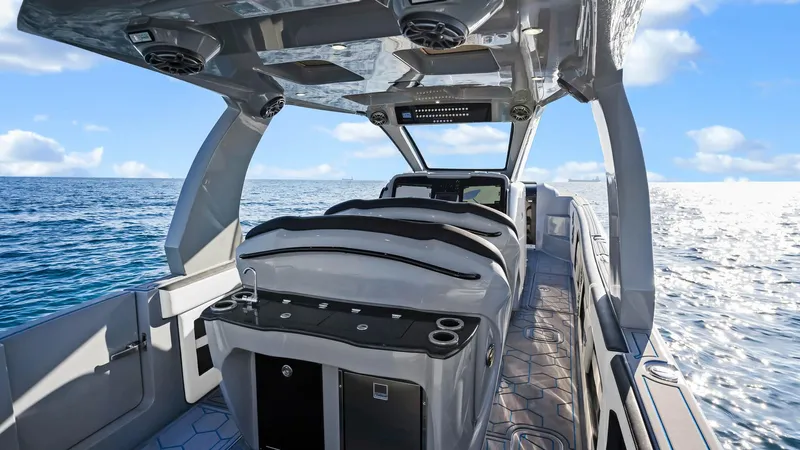  Yacht Photos Pics 2022 Deep Impact 399 Cabin boat interior with sleek design on open water.