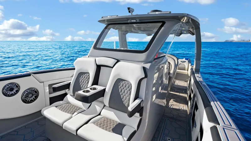  Yacht Photos Pics 2022 Deep Impact 399 Cabin boat interior with luxury seating on open water.