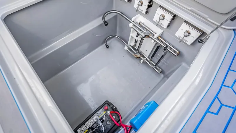  Yacht Photos Pics Storage compartment of 2022 Deep Impact 399 Cabin boat with battery and wiring.