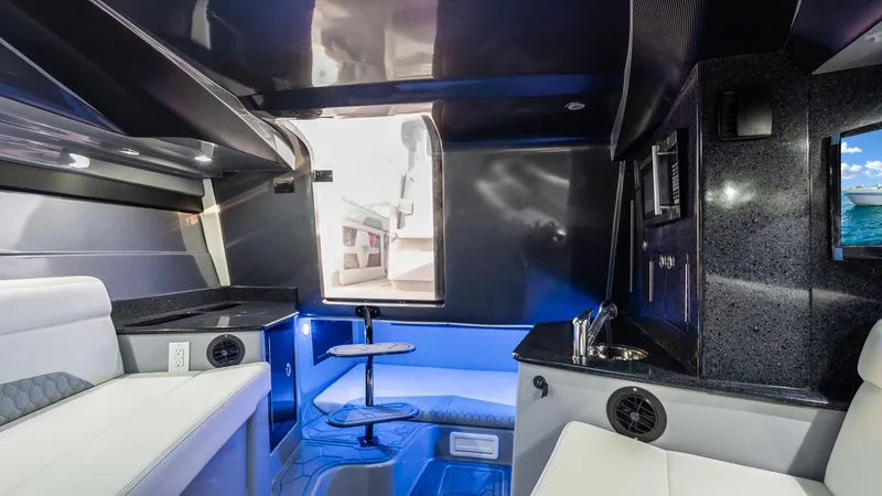  Yacht Photos Pics Luxurious interior of 2022 Deep Impact 399 Cabin boat with modern amenities and sleek design.