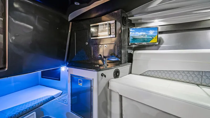  Yacht Photos Pics 2022 Deep Impact 399 Cabin interior with modern amenities and sleek design.