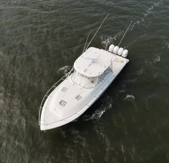Headhunter Yacht Photos Pics 2010 SeaVee 430 Sport Express boat cruising on open water, aerial view.