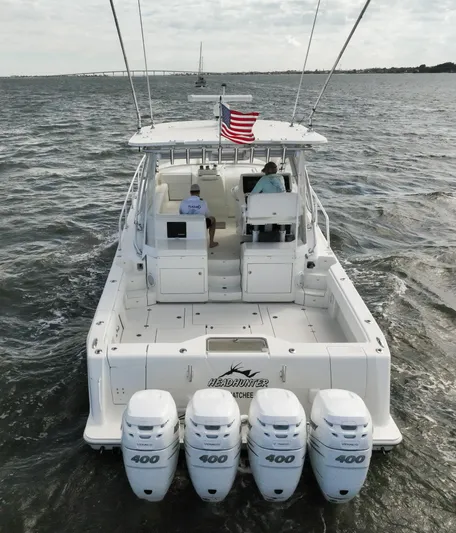 Headhunter Yacht Photos Pics 2010 SeaVee 430 Sport Express boat with four 400 HP engines on open water.