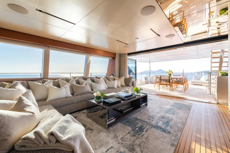 Mac One Yacht Photos Pics Luxurious interior of 2019 Custom Line Navetta 33 yacht with spacious seating and ocean views.