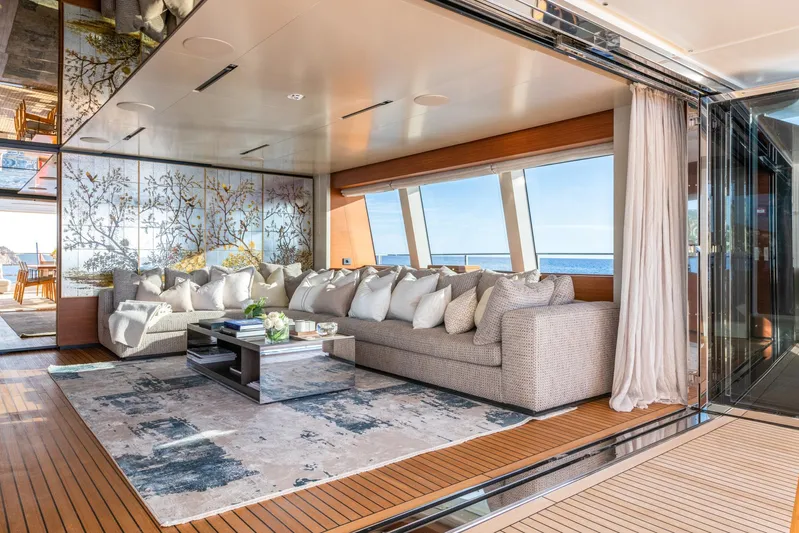 Mac One Yacht Photos Pics Luxurious 2019 Custom Line Navetta 33 yacht interior with elegant seating and ocean view.