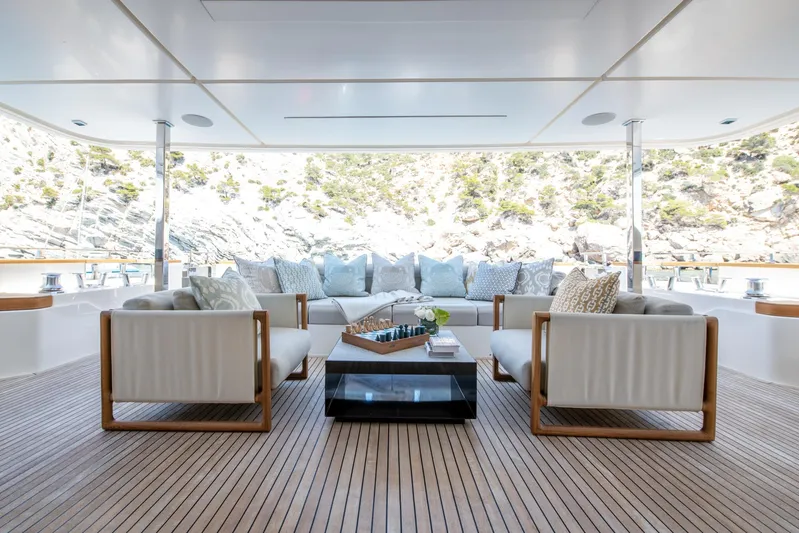 Mac One Yacht Photos Pics Luxurious 2019 Custom Line Navetta 33 yacht interior with elegant seating and scenic views.