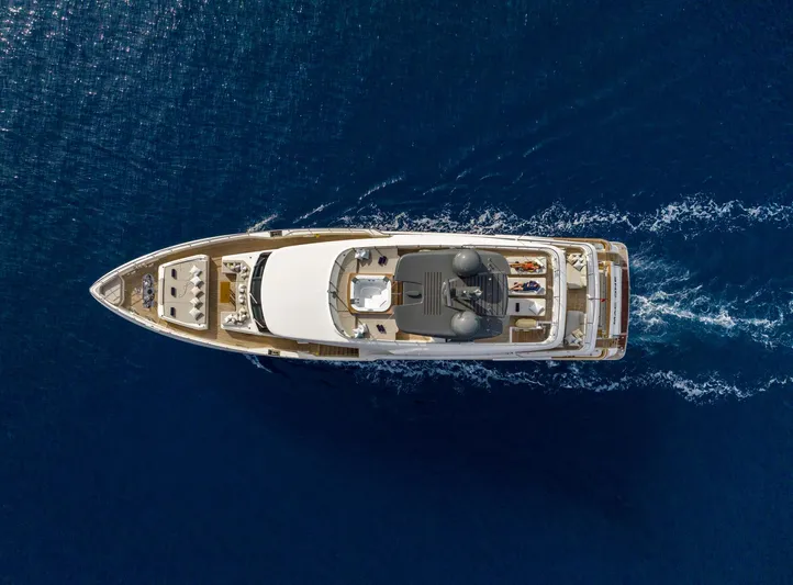 Mac One Yacht Photos Pics Aerial view of 2019 Custom Line Navetta 33 yacht cruising on open sea.
