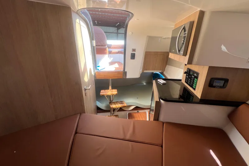  Yacht Photos Pics Interior of 2024 NX Boats 290 Exclusive, featuring modern design and comfortable seating.