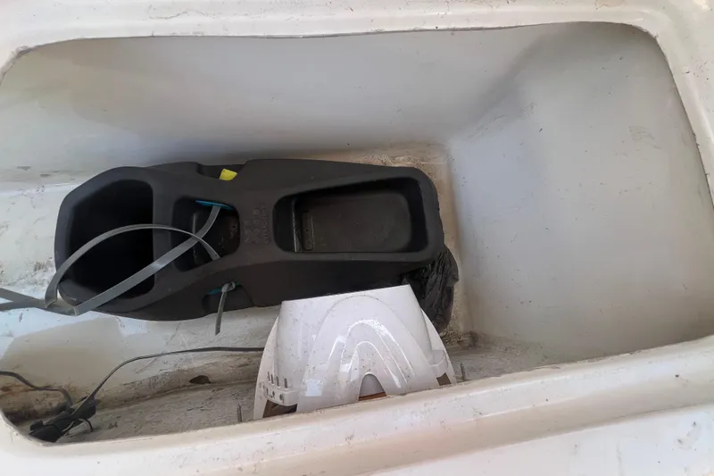  Yacht Photos Pics Storage compartment of 2024 NX Boats 290 Exclusive, featuring equipment and cables.