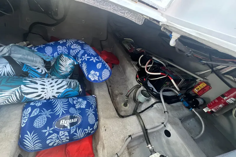  Yacht Photos Pics Interior of 2024 NX Boats 290 Exclusive showing storage and electrical components.