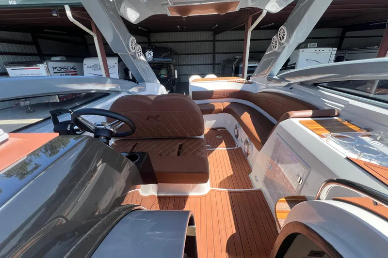  Yacht Photos Pics 2024 NX Boats 290 Exclusive interior with luxurious seating and modern design.