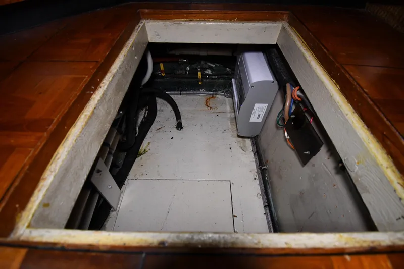 Patience III Yacht Photos Pics Bilge compartment of 1988 Viking 48 Convertible boat, showing wiring and equipment.