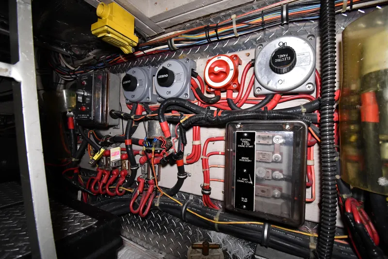 Patience III Yacht Photos Pics Electrical panel and wiring inside a 1988 Viking 48 Convertible boat.