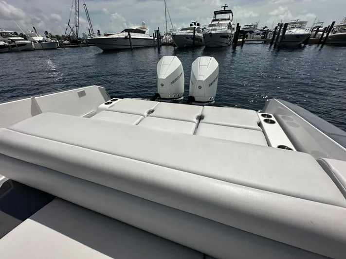  Yacht Photos Pics Aviara AV 32 OB 2022 boat with dual Mercury outboard engines docked at marina.