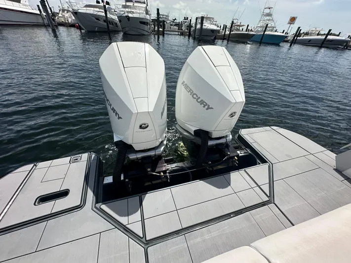  Yacht Photos Pics Twin Mercury outboard engines on 2022 Aviara AV 32 OB boat at marina.
