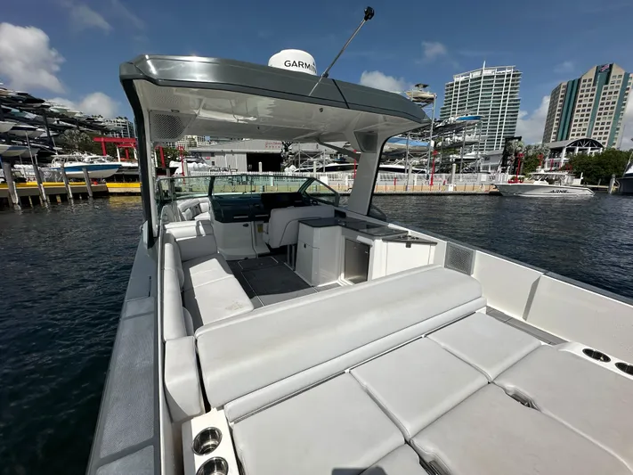  Yacht Photos Pics 2022 Aviara AV 32 OB boat docked, featuring spacious seating and modern design.