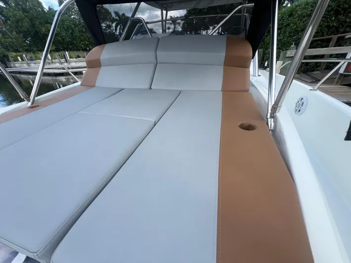  Yacht Photos Pics 2025 Beneteau Flyer 9 SUNdeck with spacious sunbathing area and sleek design.