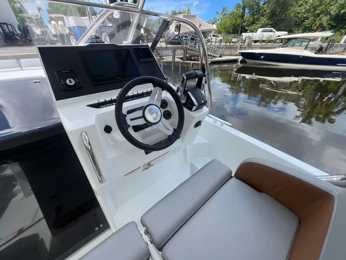  Yacht Photos Pics 2025 Beneteau Flyer 9 SUNdeck helm with modern controls and comfortable seating.