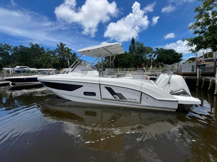  Yacht Photos Pics 2025 Beneteau Flyer 9 SUNdeck boat docked on a sunny day.