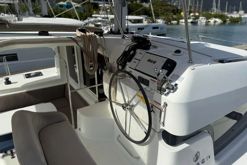 Noble Shadow Yacht Photos Pics 2022 Lagoon 40 yacht helm with B&G navigation, docked in marina.