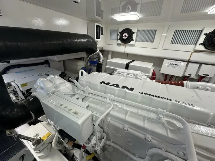 Galati Yacht Sales Trade Yacht Photos Pics Engine room of 2022 Viking 44 Sport Coupe with MAN Common Rail engine.