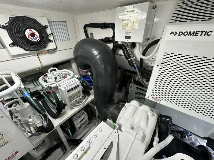 Galati Yacht Sales Trade Yacht Photos Pics Engine room of 2022 Viking 44 Sport Coupe with Dometic equipment and ventilation system.