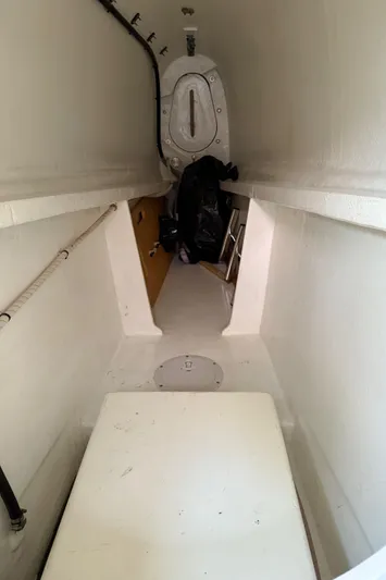 Jammy Yacht Photos Pics Interior view of a 2015 Gunboat 57' yacht, featuring a narrow passageway.