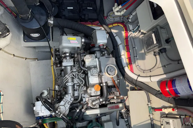 Jammy Yacht Photos Pics Engine compartment of a 2015 Gunboat 57' yacht, showcasing detailed mechanical components.