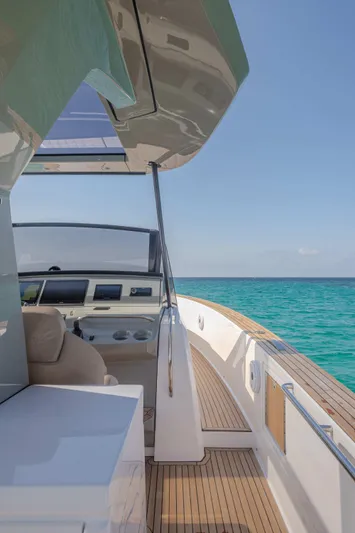 Pardo 43 Yacht Photos Pics 2024 Pardo Yachts 43 cruising on clear blue waters, showcasing sleek design and luxury.