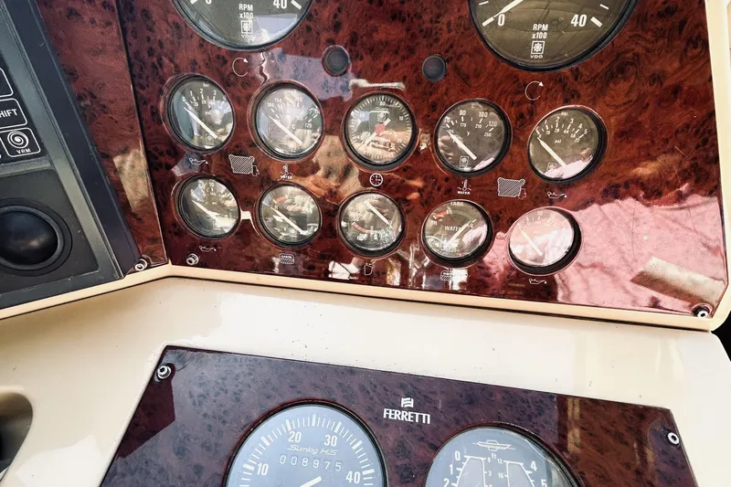  Yacht Photos Pics Dashboard of a 1992 Ferretti Yachts 45 Altura with multiple gauges and controls.
