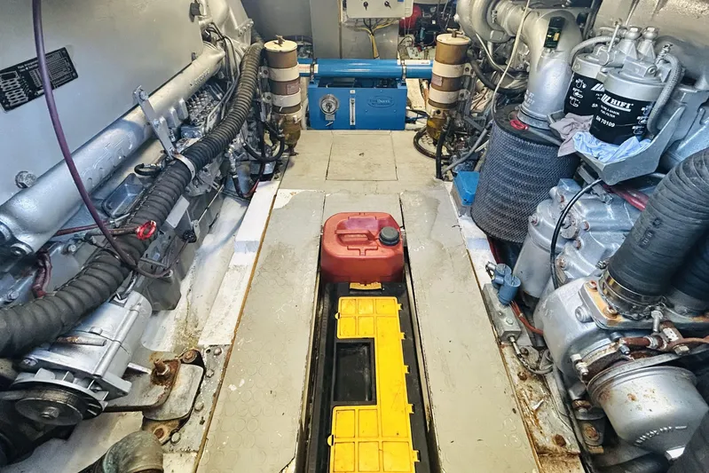  Yacht Photos Pics Engine room of 1992 Ferretti Yachts 45 Altura, showcasing mechanical components and systems.